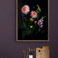 Botanical print of summer flowers, including dahlias on a dark background, framed on a dark plum coloured wall.