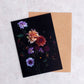 Botanical greeting card with mixed colour Dahlias and berries on a black background