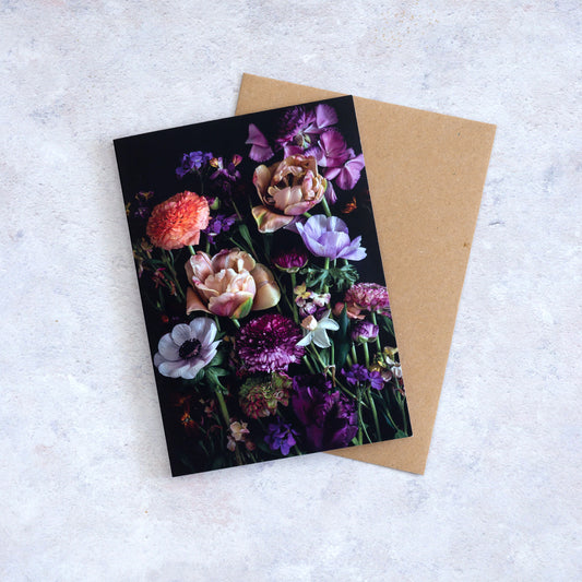 Botanical greeting card with mixed Spring Flowers photographed on a black background